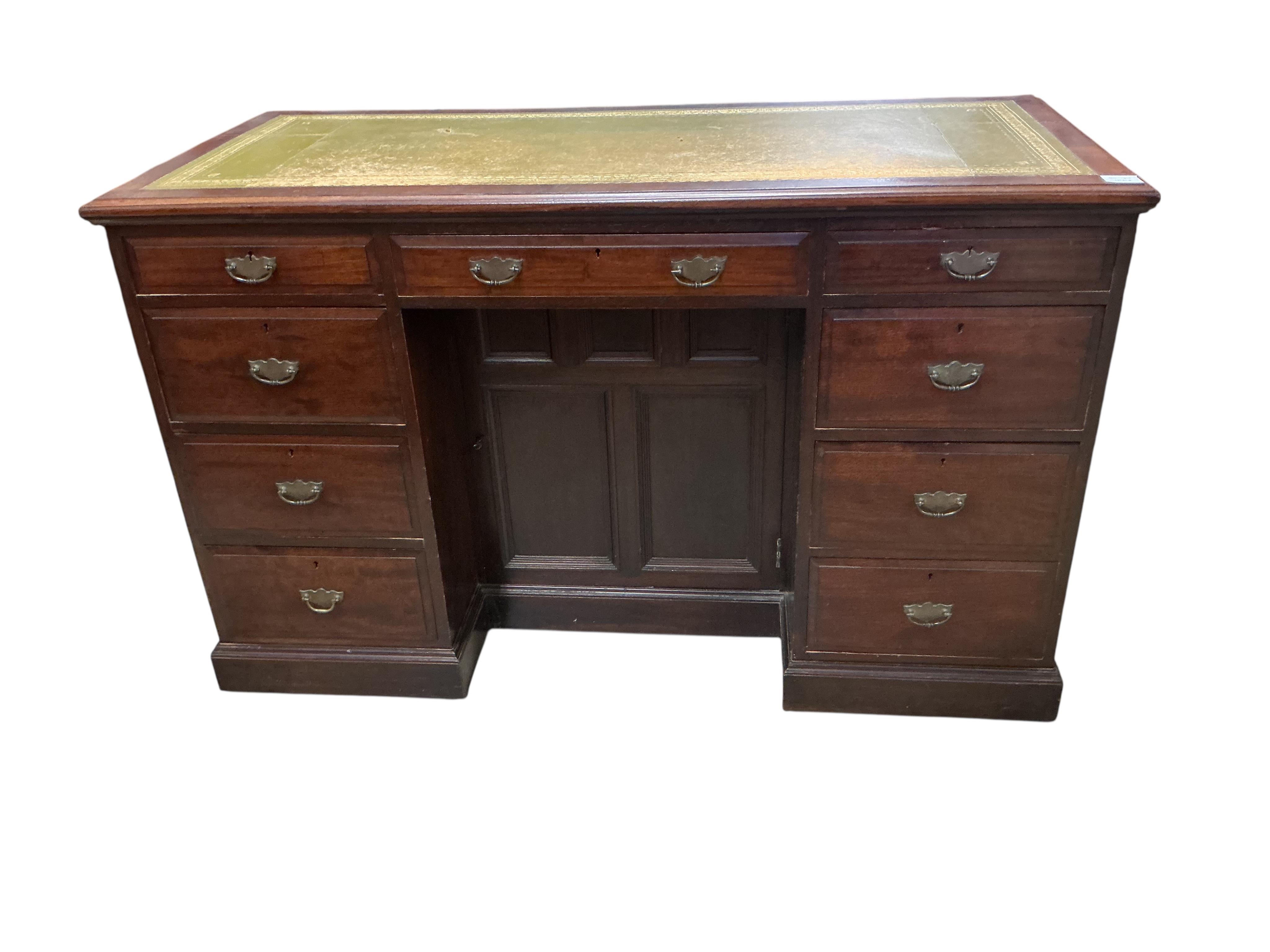 A late Victorian mahogany kneehole desk, width 125, depth 56cm, height 76cm